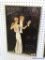 FRAMED ADVERTISEMENT PRINT; VINTAGE THEATER ADVERTISEMENT THAT SHOWS A DANCING COUPLE AND IS