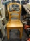 WOODEN SIDE CHAIR; ARCHED BACK WITH 2 ARCHED SLATS SITTING ON 4 TAPERED LEGS. MEASURES 17.5 IN X 17