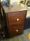 NIGHTSTAND; 2 DRAWER MAHOGANY NIGHTSTAND WITH PORCELAIN KNOB PULLS. MEASURES 18 IN X 21 IN X 30 IN