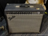 FENDER STAGE 112SE AMPLIFIER; BLACK IN COLOR, MODEL #PR424, SERIAL #M1256312. ESTIMATED VALUE ON