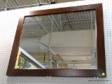 FRAMED MIRROR; IN A MAHOGANY FRAME MEASURES 36 IN X 32 IN