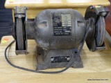 BENCH GRINDER; HAS DUAL 6 IN DIA GRINDING WHEELS AND A 1/2 HP MOTOR. MODEL B-6. IN GOOD USED