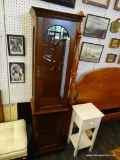 WOODEN CURIO CABINET; BEAUTIFUL RICH WOOD CURIO CABINET WITH BEVELED TOP, GLASS SIDES AND TWO GLASS