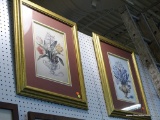 PAIR OF FRAMED FLORAL PRINTS; BOTH PRINTS SHOW BOUQUETS OF FLOWERS IN DOUBLE HANDLED VASES. DOUBLE