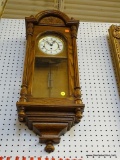 HOWARD MILLER WALL CLOCK; VINTAGE WOODEN HOWARD MILLER WALL CLOCK MODEL #612-462. THIS CLOCK IS