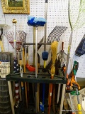 LOT OF ASSORTED HAND TOOLS; LOT INCLUDES 16 DIFFERENT TOOLS SUCH AS A PITCH FORK, BROOM, A RAKE, AN