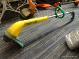 WEEDEATER TRIMMER; GREEN AND YELLOW ELECTRIC SNAP-N-GO TRIMMER MADE BY WEEDEATER. MEASURES 45 IN.