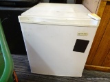MAGIC CHEF MINI REFRIGERATOR; WHITE IN COLOR AND MEASURES 18 IN X 20 IN X 20 IN