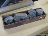 WOODEN BOX OF METAL WEIGHTS; VINTAGE WOODEN BOX FILLED WITH 8 VINTAGE WEIGHTS. SOME ARE MARKED