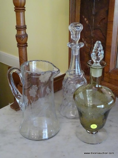 (DR) VINTAGE GLASS DECANTERS AND PITCHER; TOTAL OF 3 PIECES, LOCATED ON TOP OF BUFFET. PITCHER HAS