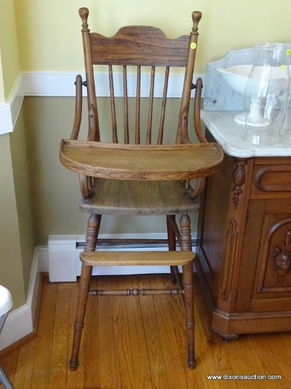 (DR) ANTIQUE WOODEN HIGH CHAIR; SOLID OAK WITH DOWEL RODS ACROSS BACK, TRAY WITH RAISED BORDER WHICH