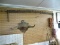 (WSHOP) CONTENTS OF WALL; INCLUDES A SET OF BULL HORNS, AN ANTIQUE 2 MAN WOOD SAW, AND 2 ELECTRICAL