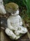 (OUT) PAINTED LITTLE GIRL STATUE; IS WHITE IN COLOR WITH BLONDE HAIR AND A RED RIBBON. MEASURES 13