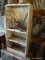 (SHED 3) 2 PIECE LOT; INCLUDES A WHITE WOODEN SHELVING UNIT WITH 1 SHELF AND HOOKS (MEASURES 22 IN X