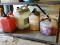 (SHED 3) BOTTOM SHELF LOT; INCLUDES A VINTAGE METAL GAS CAN, A BLITZ GAS CAN, ETC.