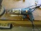 (WSHOP) BLUE AND GRAY DRILL; HAS A SANDING WHEEL ATTACHMENT. IS IN GOOD USED CONDITION AND READY FOR