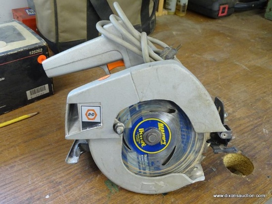 (WSHOP) BLACK & DECKER CIRCULAR SAW; IS 7-1/4 IN DIA. IN GOOD USED CONDITION. MODEL 7301. 120 VOLTS