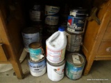 (WSHOP) CONTENTS UNDER DESK; INCLUDES CANS OF POLYURETHANE, WOOD STAIN, METAL AND WOOD ENAMEL, AND