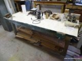 (WSHOP) WORKTABLE; MADE OF WOOD WITH LINOLEUM COVERED TOP. MEASURES 83 IN X 36 IN X 32 IN. INCLUDES