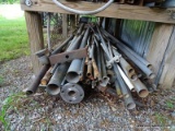 (OUT) SHELF LOT OF METAL; ASSORTED METAL PIECES SUCH AS ASSORTED METAL PIPING, REBAR, WEIGHTS, AND