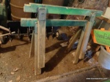 (SHED 1) PAIR OF WOODEN SAWHORSES; GREEN IN COLOR AND IN GOOD USED CONDITION! MEASURE 48 IN X 34 IN.