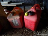 (SHED 2) 2 GAS CANS; BOTH ARE 5 GALLONS AND IN GOOD CONDITION!