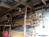 (SHED 2) SHELF LOT OF WOOD; INCLUDES TRIM, WOOD SHIMS, PLANKS, AND MORE!