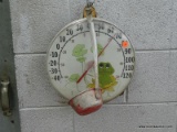 (SHOP 2) THERMOMETER AND DIPPER- HANGING THERMOMETER WITH PAINTED FROG- 12 IN DIA AND A DIPPER