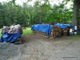 LARGE PILES OF WOOD.