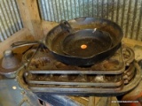 (SHED 3) CAST IRON LOT; INCLUDES A WAGNER CAST IRON FRYING PAN, 2 CAST IRON CORN ON THE COB