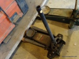 (SHED 3) FLOOR JACK; HAS A 3 TON LIFTING CAPACITY AND IS IN GOOD USED CONDITION.