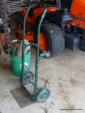 (SHED 3) HAND TRUCK; GREEN DOLLY WITH MOVEABLE HANDLE. MEASURES 45 IN TALL