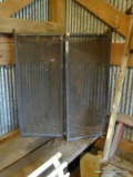 (SHED 3) FIREPLACE GRATE; 3 SECTION METAL AND MESHED WIRE FIREPLACE GRATE. MEASURES 52 IN X 31.5 IN