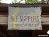 (SHED 3) ADVERTISING SIGN; BEE SUPPLY ADVERTISING SIGN IN POOR CONDITION- 23 IN X 18 IN