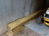 (SHED 4) ASSORTED TREATED LUMBER; INCLUDES FOUR 10 FT BOARDS, AND 11 SMALLER BOARDS.
