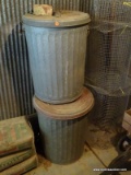 (SHED 4) 2 METAL TRASH CAN LOT; BOTH HAVE LIDS AND MEASURE 18 IN X 25 IN