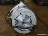 (WSHOP) SKIL CIRCULAR SAW; IS 6-1/2 IN DIA. IN GOOD USED CONDITION. MODEL 534. HAS 115 VOLTS AND 9