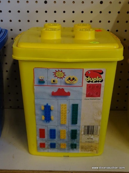 DUPLO BUILDING BLOCK SET; IN THE ORIGINAL YELLOW CONTAINER AND IS MADE UP OF ASSORTED COLORFUL