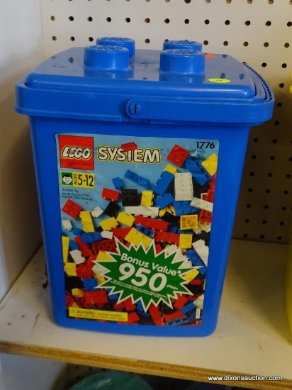 LEGO BUILDING BLOCK SET; IN THE ORIGINAL BLUE CONTAINER AND IS MADE UP OF VARIOUS ASSORTED COLORFUL