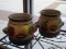 PAIR OF CERAMIC PLANTERS; ONE HAS STRAWBERRY DESIGN, OTHER HAS TOMATO PLANTS AND HERBS. BOTH HAVE