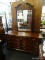 KINCAID MAHOGANY MIRRORED DRESSER; BROKEN ARCH PEDIMENT BEVELED MIRROR WITH ACORN FINIAL SITTING