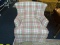 PASTEL PLAID ARMCHAIR; SHADES OF PINK, LIGHT GREEN, AND WHITE PLAID UPHOLSTERY COVER THIS CHAIR,