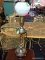 VINTAGE TALL BRASS TABLE LAMP WITH ROUND WHITE GLOBE ON TOP; HAS A URN CENTER SEGMENT, TURNED POST,