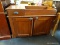 ANTIQUE DRY SINK; MADE OF SOLID REDDISH COLORED HARDWOOD, WITH A SINGLE DRAWER TO THE LEFT OF THE