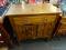 ANTIQUE SERVER; PINE SERVER WITH 1 DRAWER OVER 2 DOORS WITH BRASS HARDWARE. IS IN EXCELLENT