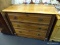 ANTIQUE DRESSER; 3 DRAWER DRESSER WITH BRASS CHIPPENDALE STYLE PULLS. MEASURES 38 IN X 16 IN X 33