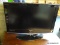 SAMSUNG FLAT SCREEN TELEVISION; BLACK SAMSUNG TV WITH HDTV AND DOLBY DIGITAL AUDIO. MODEL #