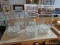 (B1A) FLORISTS VASES; TOTAL OF 5. ALL ARE CLEAR IN COLOR AND HAVE DOUBLE SIDED FOAM HOLDERS. MEASURE