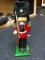 (FL) HOLIDAY NUTCRACKER; IN THE FORM OF A BRITISH ROYAL GUARD WITH RIFLE. MEASURES 15 IN TALL. IS A
