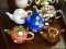 ASSORTED TEAPOTS LOT; 1 IS OFF-WHITE IN COLOR, 1 IS GOLD TONED IN COLOR, 1 IS STRAWBERRY THEMED, 1